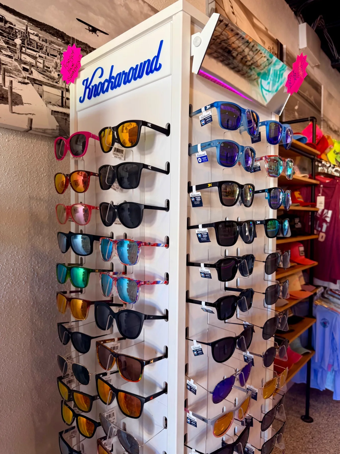 Wall of Knockaround sunglasses in every color at AMI FroYo