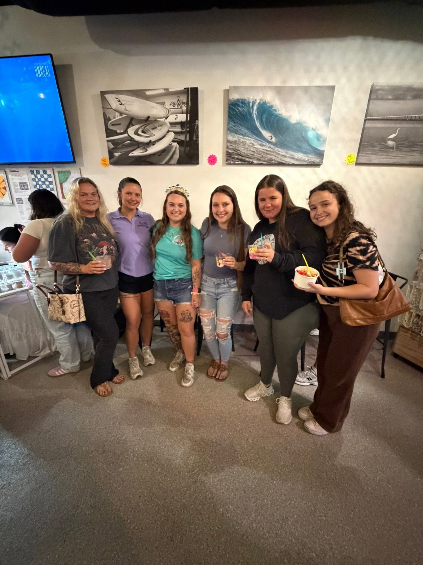 Group of friends celebrating a birthday with AMI froyo bowls